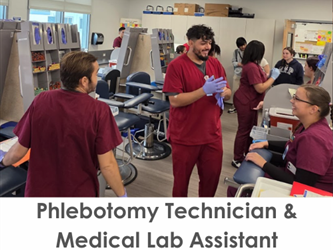 Phlebotomy students practice their skills in the lab